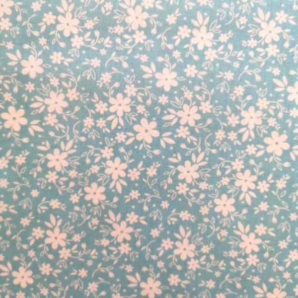 Small White Flowers On Sky Blue Polycotton